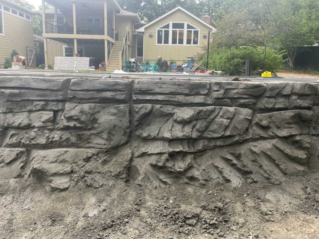 Sculpted Concrete Retaining Wall