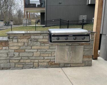Outdoor kitchen with built in grill