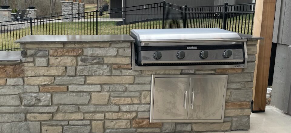 Outdoor kitchen with built in grill